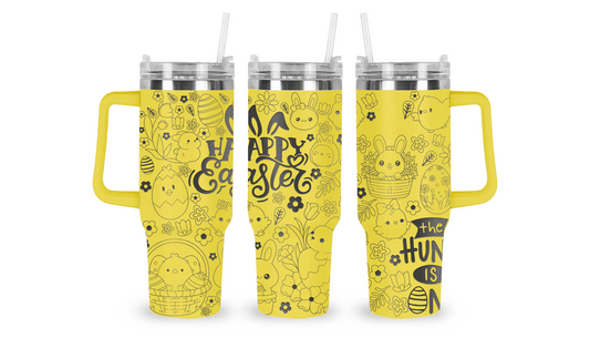 Stainless steel tumbler with an engraved Easter design, featuring bunnies, eggs, and floral details.
