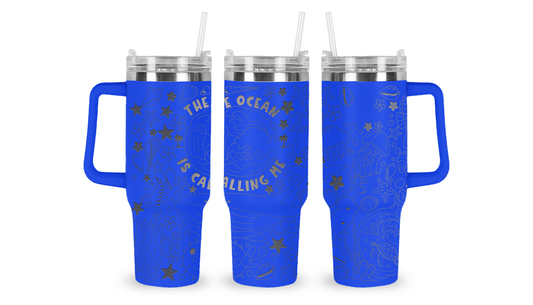 40oz stainless steel tumbler featuring an intricately engraved ocean-themed design. The detailed etching showcases waves, marine life, and ocean-inspired elements, bringing a serene and stylish touch to this high-capacity drinkware piece."
