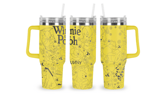 Stainless steel tumbler with an engraved Winnie the Pooh design, featuring Pooh, Piglet, and Hundred Acre Wood details.