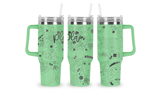 Stainless steel tumbler with an engraved St. Patrick’s design, featuring shamrocks and Celtic patterns.