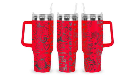 Stainless steel tumbler with an engraved volleyball design, featuring a volleyball in motion with sporty details.